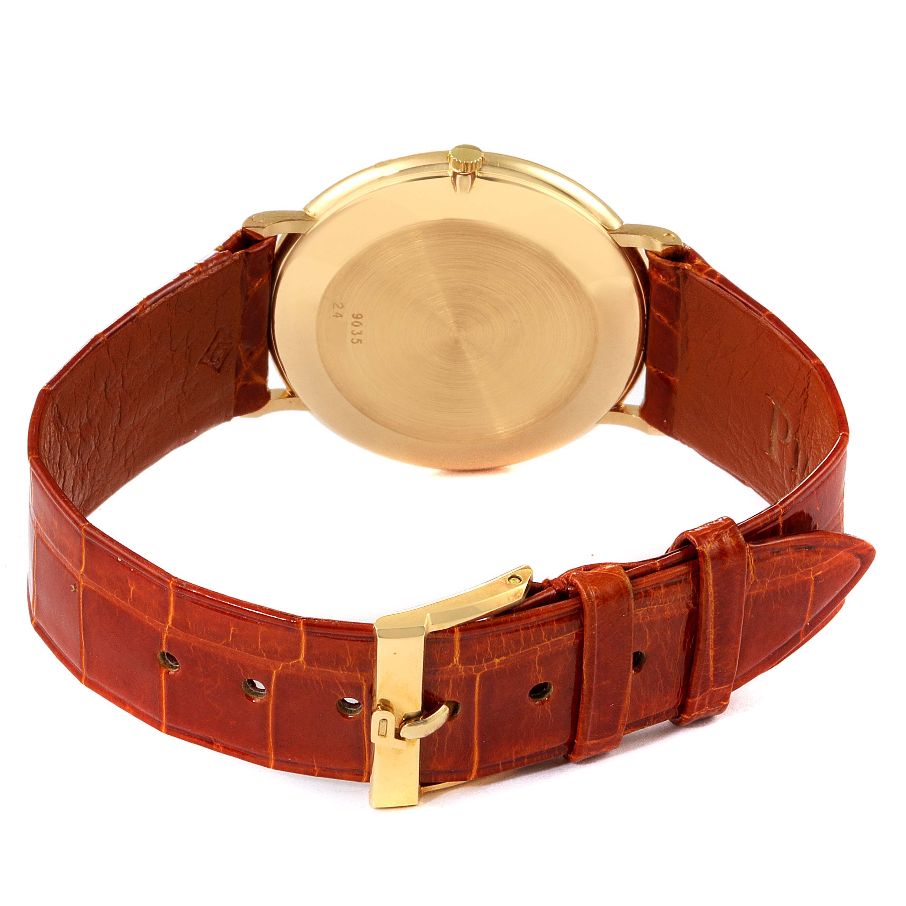 The image shows the back case and leather strap of a Piaget 9035 Men's Yellow Gold Green Dial 9035 Men's Yellow Gold Green Dial Yellow Gold Malachite Stone Dial Vintage Men's Watch 9035 model.