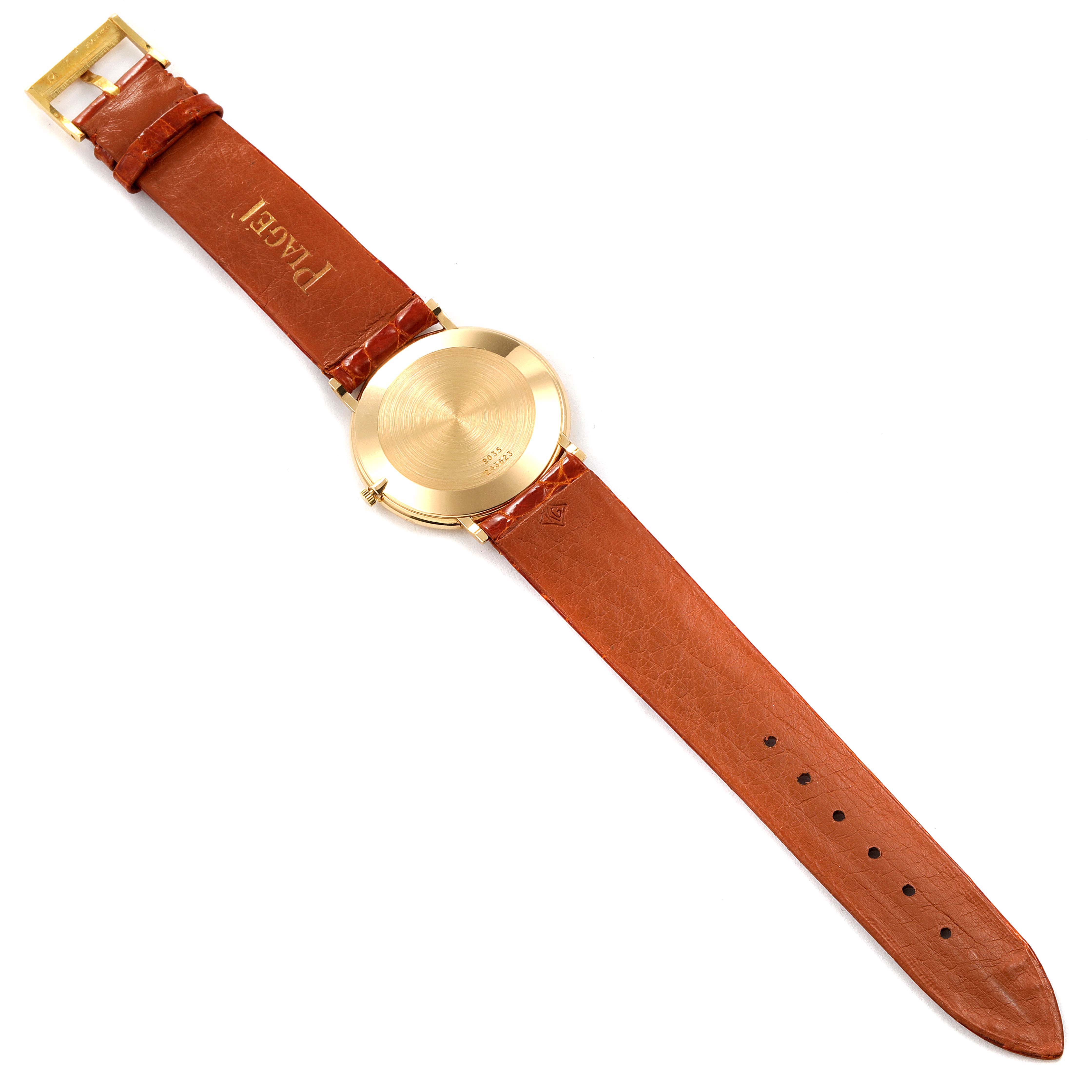 The image shows the back view of a Piaget 9035 Men's Yellow Gold Green Dial 9035 Men's Yellow Gold Green Dial Yellow Gold Malachite Stone Dial Vintage Men's Watch 9035, highlighting the strap and case back.