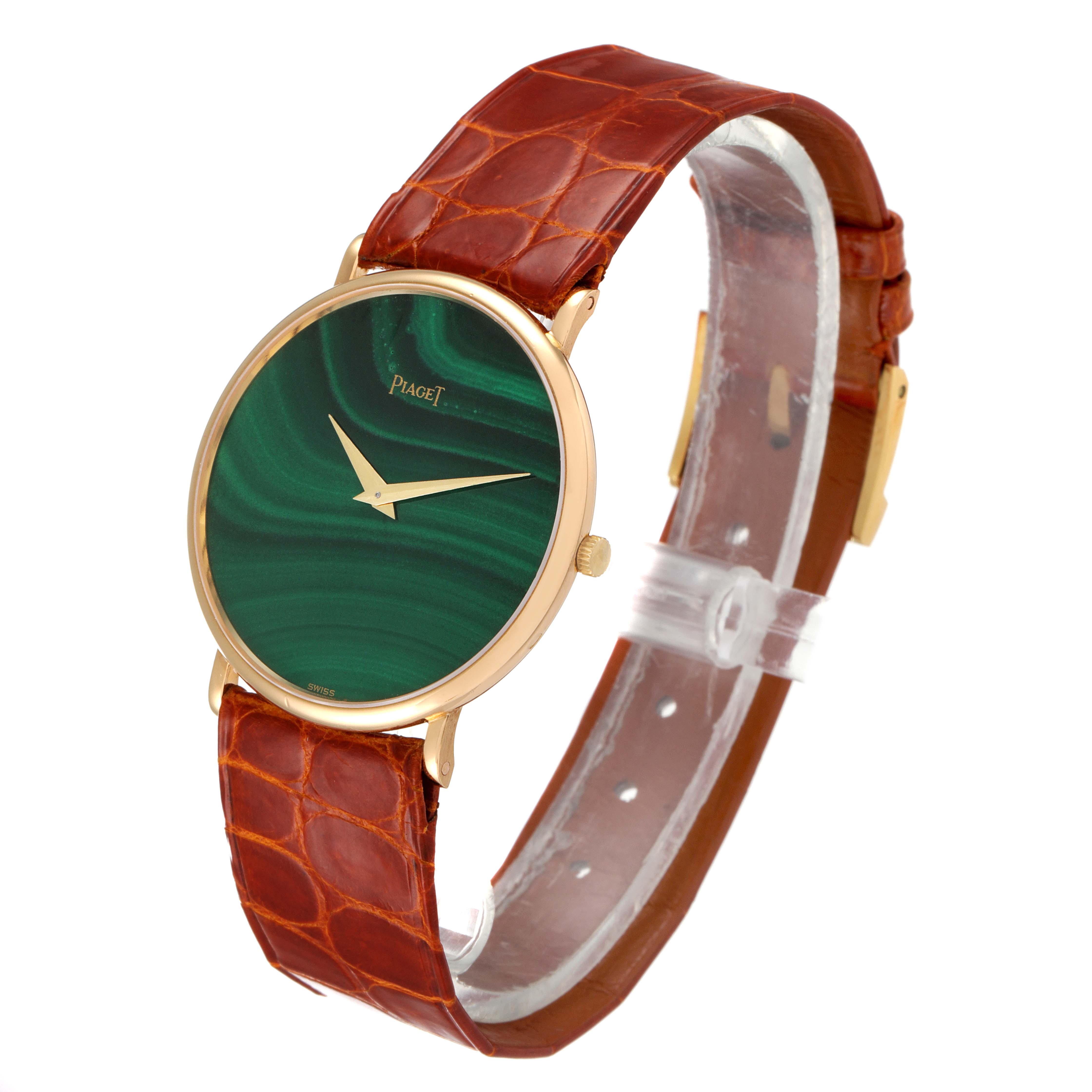 This Piaget 9035 Men's Yellow Gold Green Dial 9035 Men's Yellow Gold Green Dial 9035 model watch is shown at a slight angle, highlighting the yellow gold malachite stone dial and brown leather strap.