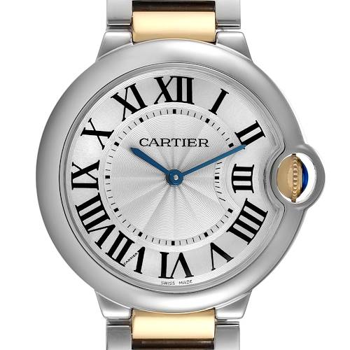 The image shows a frontal view of the Cartier Ballon Bleu W69008Z3 Men's Steel and Gold (two tone) Silver Dial W69008Z3 Men's Steel and Gold (two tone) Silver Dial watch, highlighting its circular dial, Roman numerals, and sapphire cabochon crown.