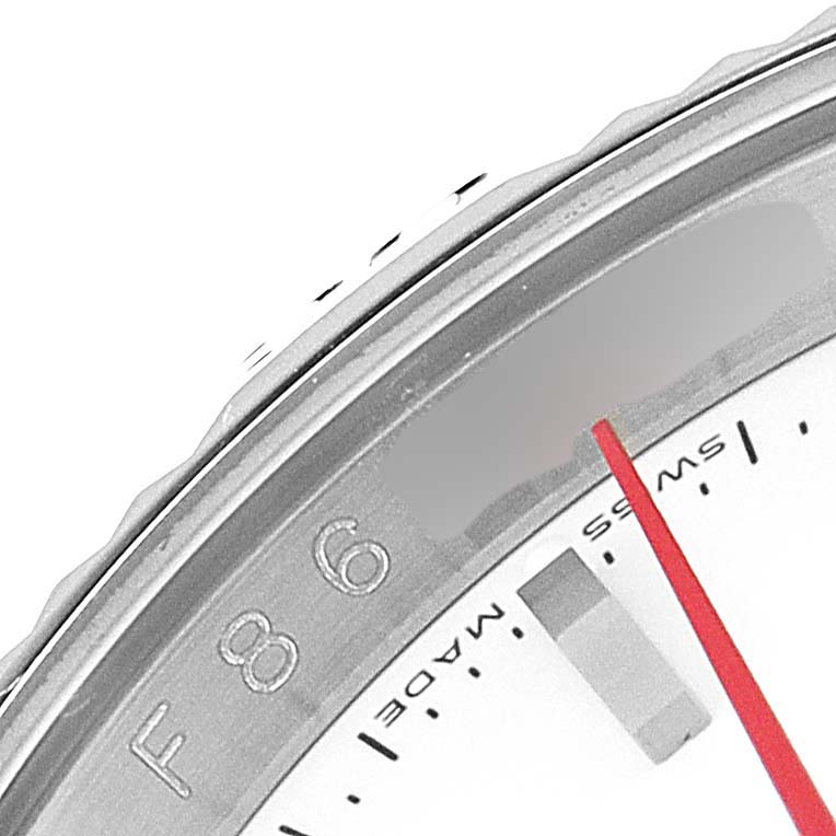 The image shows a close-up of the bezel and part of the dial of a Rolex Turn-o-Graph 116264 Men's Stainless Steel White Dial 116264 Men's Stainless Steel White Dial watch.