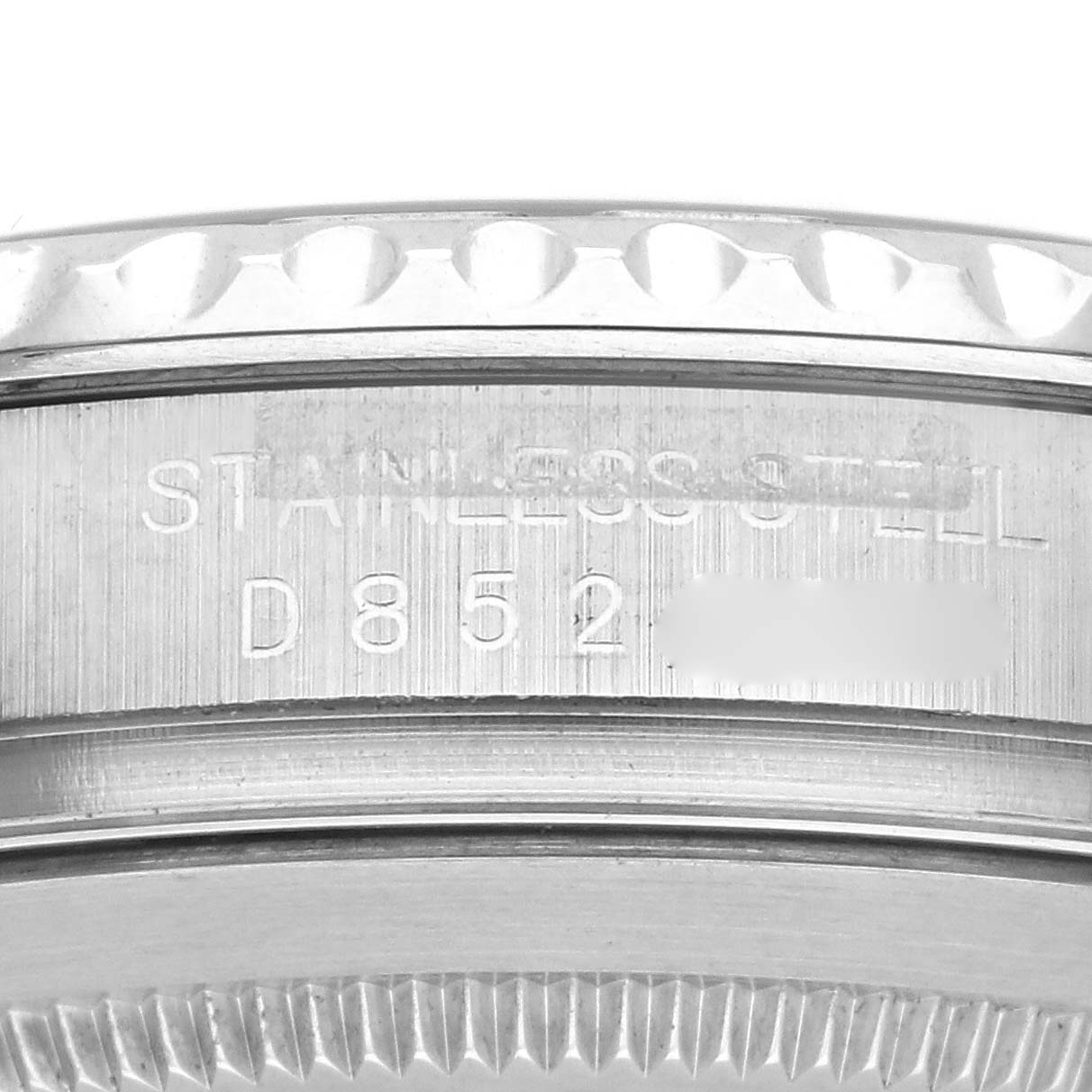 The image shows the side of a Rolex Yacht-Master 16622 Men's Stainless Steel Silver Dial 16622 Men's Stainless Steel Silver Dial watch with engraving details.