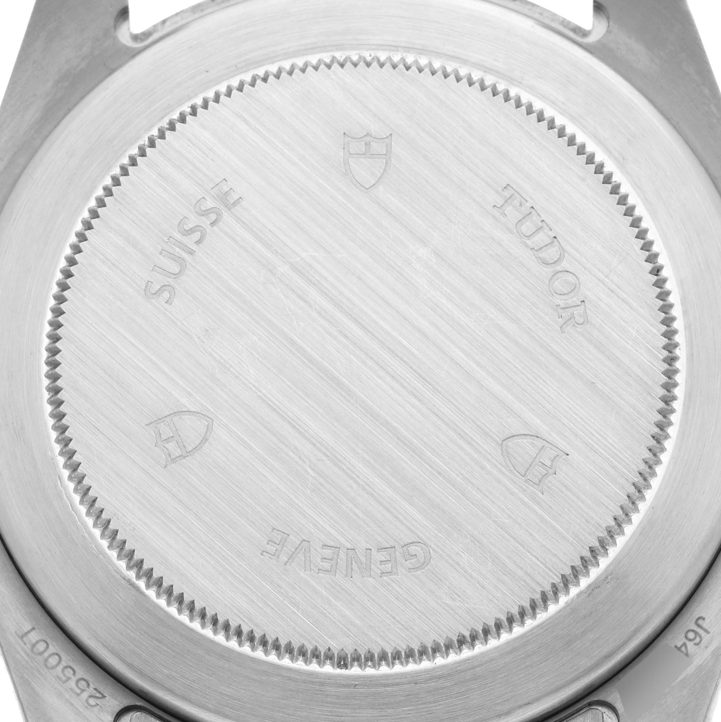 The image shows the case back of a Tudor Pelagos 25500TN Men's Titanium Black Dial 25500TN Men's Titanium Black Dial watch, highlighting engraved details and branding.