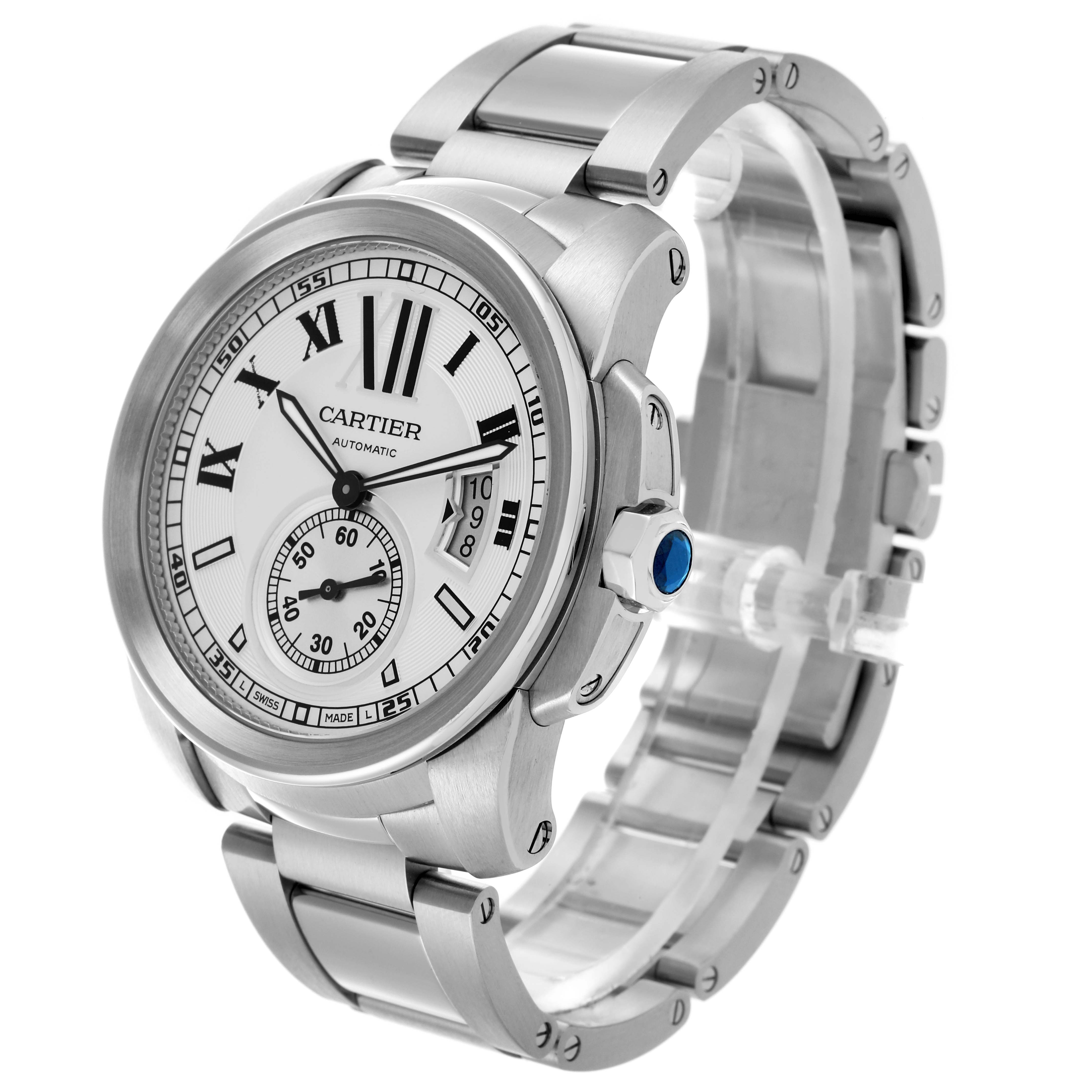 The Calibre de Cartier watch is shown at a three-quarter angle, highlighting the face, bezel, crown, and bracelet.