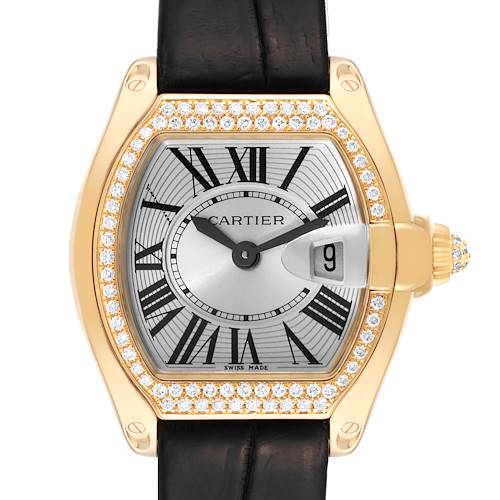 The Cartier Roadster WE500160 Women's Yellow Gold Silver Dial WE500160 Women's Yellow Gold Silver Dial model watch is shown from the front, featuring a diamond-encrusted bezel, Roman numerals, and a black leather strap.
