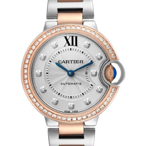 The Cartier Ballon Bleu WE902077 Women's Steel and Gold (two tone) Silver Dial WE902077 Women's Steel and Gold (two tone) Silver Dial watch is shown from a front angle, highlighting its dial, diamond bezel, and part of the bracelet.