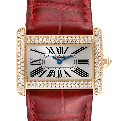 The Cartier Tank Divan WA301071 Women's Yellow Gold Silver Dial WA301071 Women's Yellow Gold Silver Dial watch is shown from the front, detailing its rectangular face, diamond-set bezel, and red leather strap.