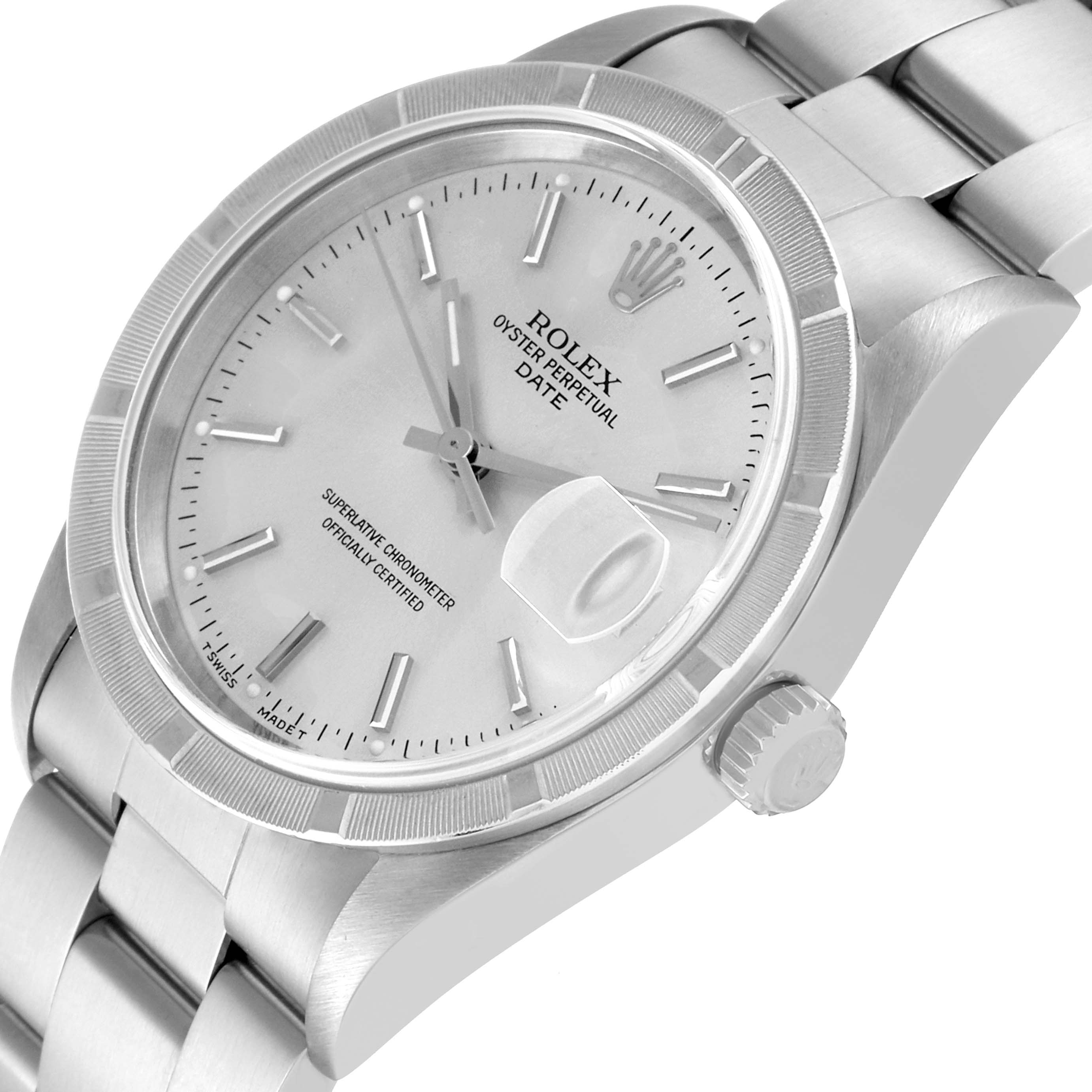 The image shows a Rolex Date 15210 Men's Stainless Steel Silver Dial 15210 Men's Stainless Steel Silver Dial model watch from a tilted angle, highlighting the dial, bezel, crown, and bracelet.