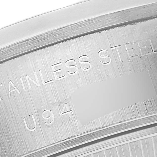 The image shows a close-up angle of the stainless steel case back of a Rolex Date 69160 Women's Stainless Steel White Dial 69160 Women's Stainless Steel White Dial model watch.