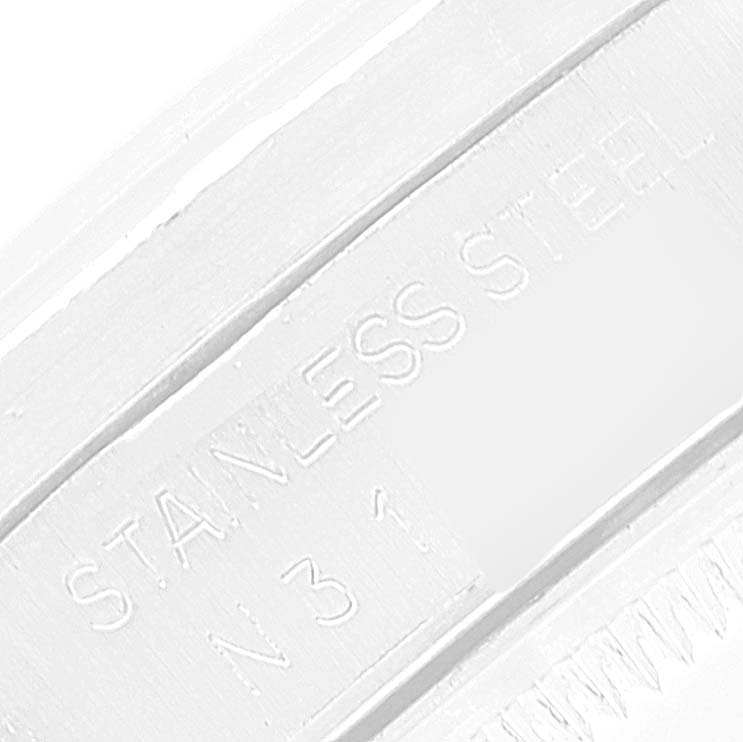 This image shows a close-up of the stainless steel part of a Rolex Date 15210 Men's Stainless Steel Silver Dial 15210 Men's Stainless Steel Silver Dial model band.