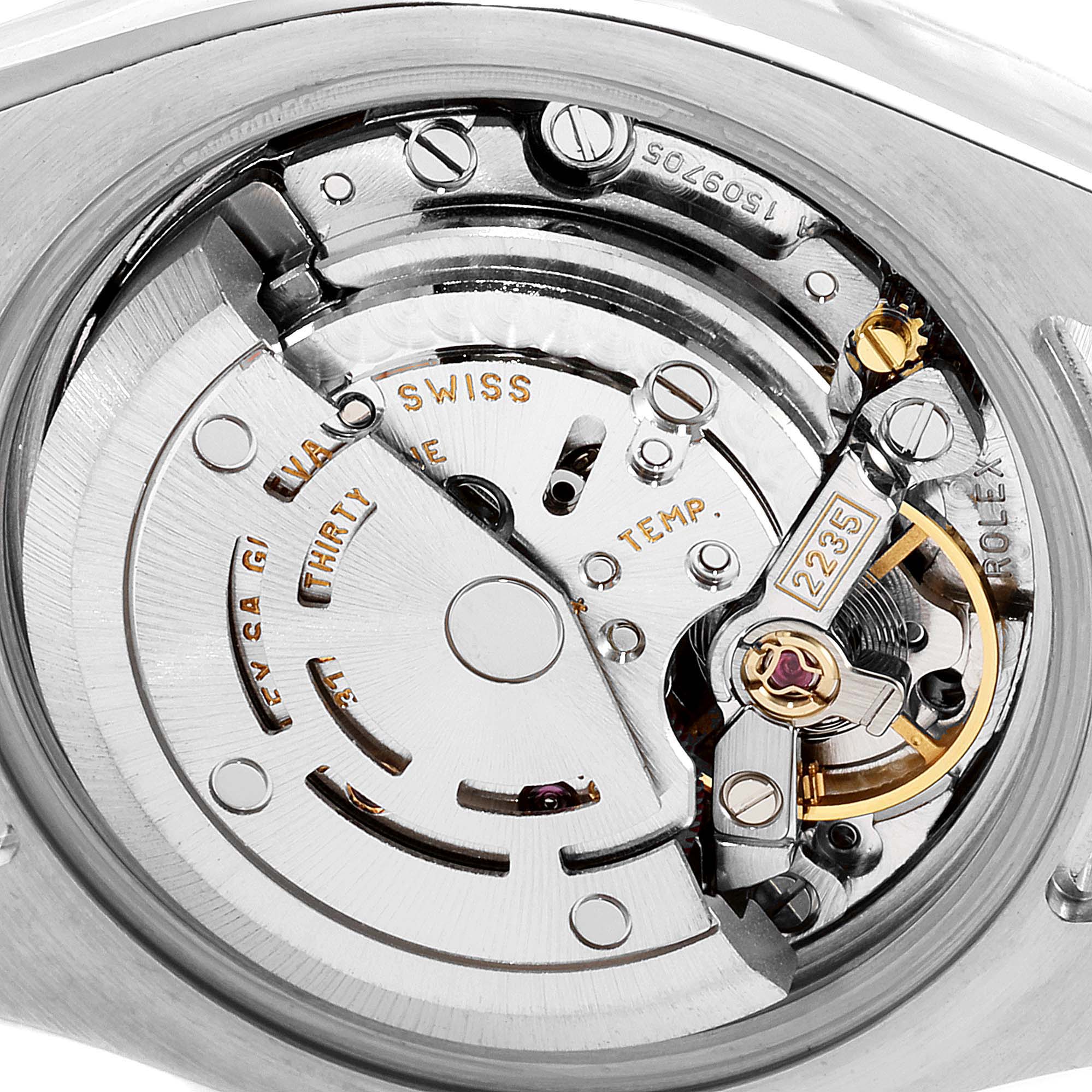 The image shows the inner mechanical movement of the Rolex Datejust 179173 Women's Steel and Gold (two tone) Mother of Pearl Dial 179173 Women's Steel and Gold (two tone) Mother of Pearl Dial watch from a close-up angle, highlighting its intricate components.