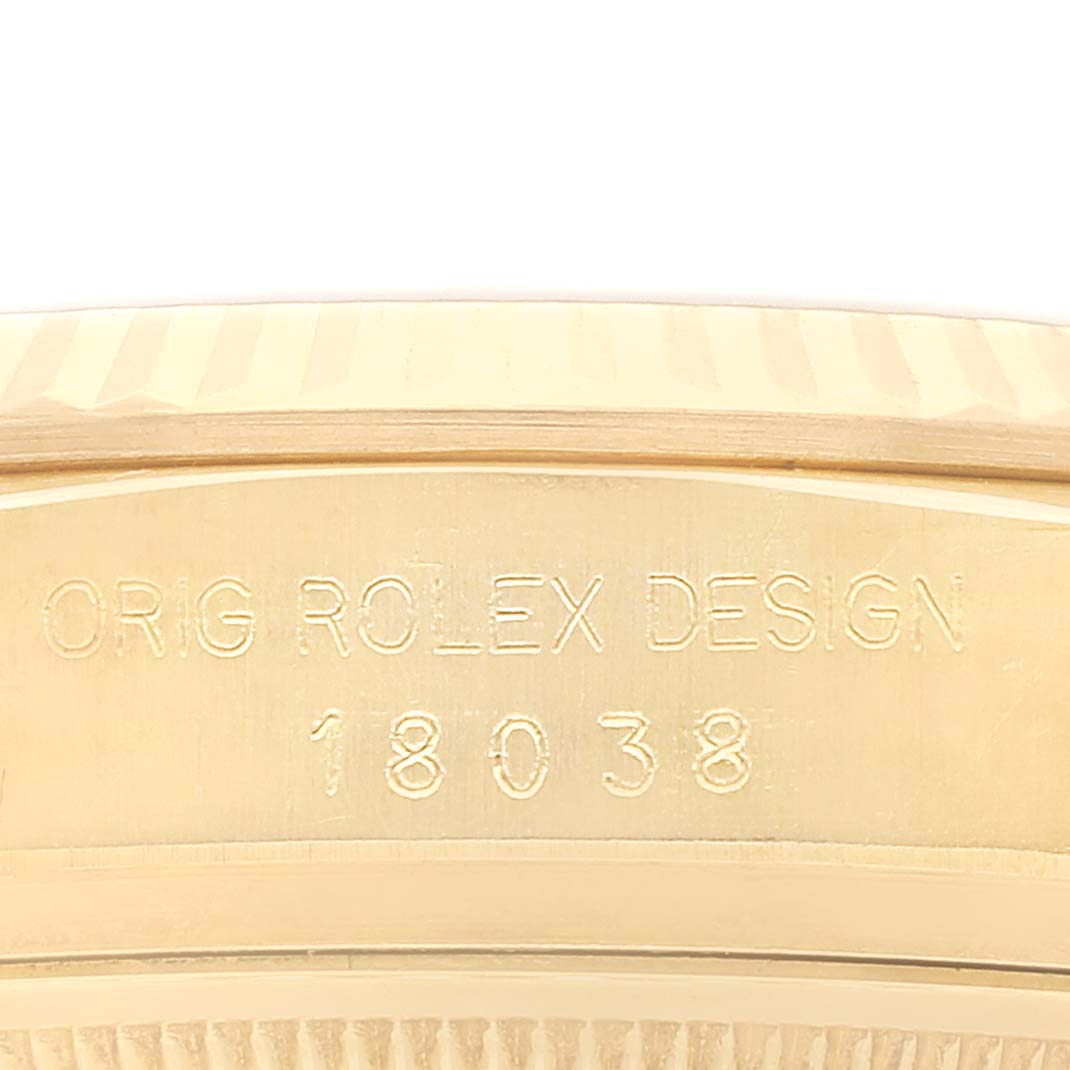 The image shows the side angle of a Rolex President 18038 Men's Yellow Gold Black Dial 18038 Men's Yellow Gold Black Dial Model 18038, focusing on its design and model number engraving.