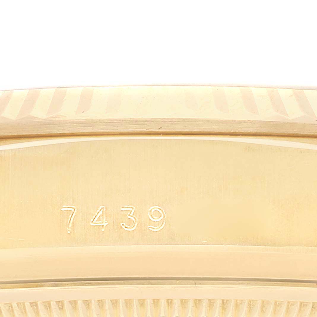 This close-up image shows the engraved number on the inner bezel of a Rolex President 18038 Men's Yellow Gold Black Dial 18038 Men's Yellow Gold Black Dial model watch.