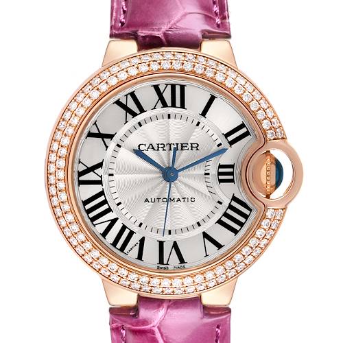 The Cartier Ballon Bleu WE902036 Women's Rose Gold Silver Dial WE902036 Women's Rose Gold Silver Dial watch is shown from the front, displaying its face, bezel, and pink leather strap.