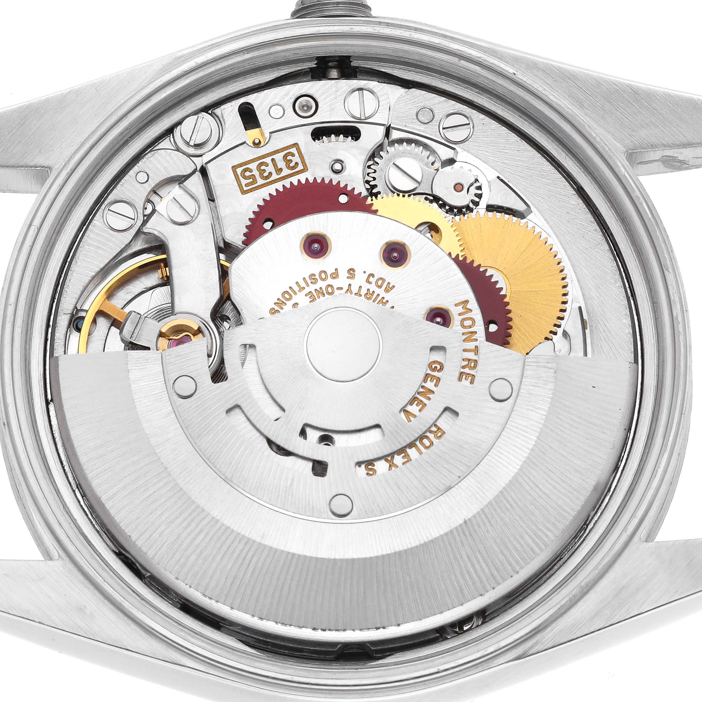 The image shows the movement and inner mechanics of a Rolex Date 15200 Men's Stainless Steel Pink Dial 15200 Men's Stainless Steel Pink Dial watch from the back.