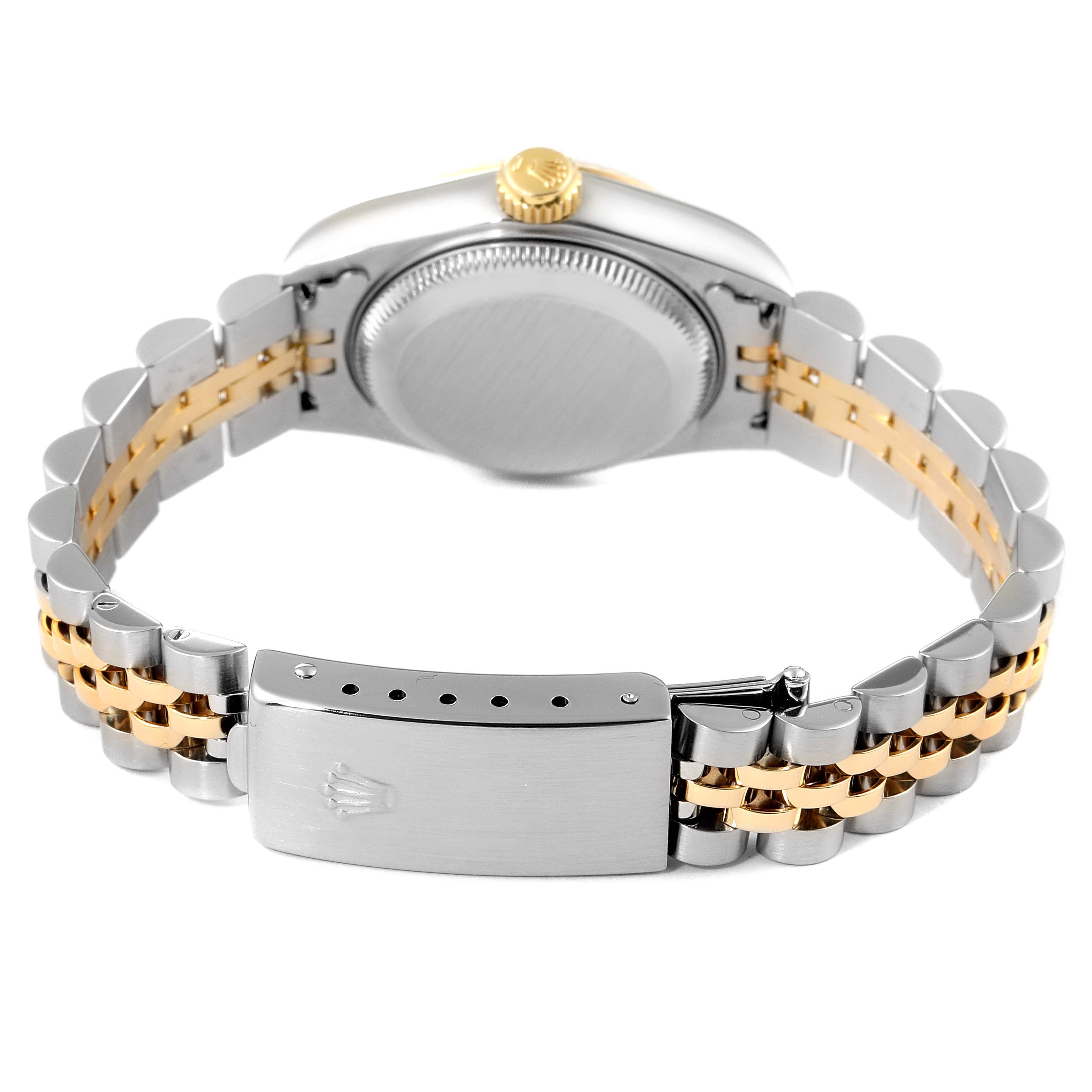 The image shows the back view of a Rolex Datejust 79173 Women's Steel and Gold (two tone) Champagne Dial 79173 Women's Steel and Gold (two tone) Champagne Dial watch, including the caseback, crown, and two-tone bracelet with a closed clasp.