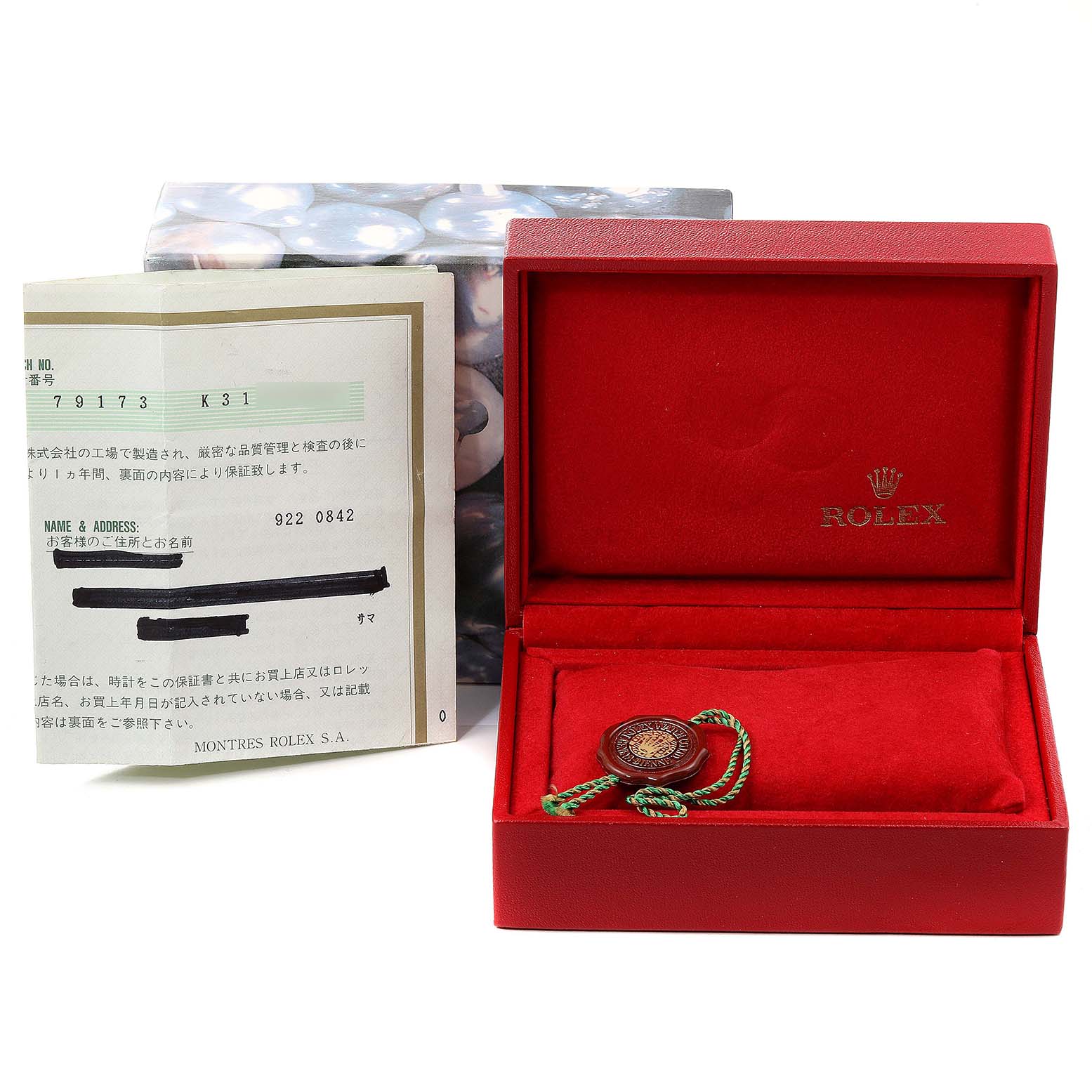 The image shows a Rolex Datejust 79173 Women's Steel and Gold (two tone) Champagne Dial 79173 Women's Steel and Gold (two tone) Champagne Dial model watch box, warranty papers, and a tag from a top-front angle.