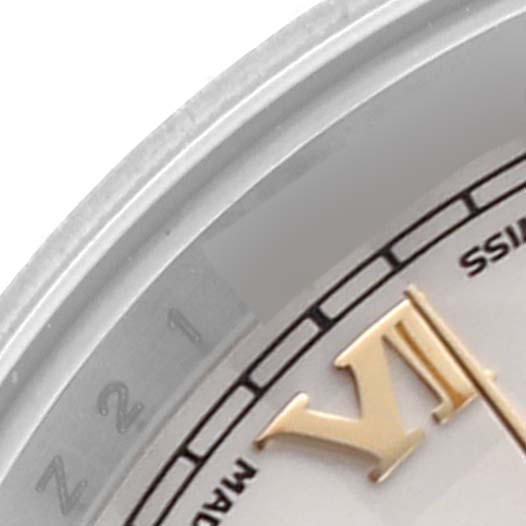 The image shows a partial close-up of a Rolex Datejust 179173 Women's Steel and Gold (two tone) Beige Dial 179173 Women's Steel and Gold (two tone) Beige Dial watch, displaying the bezel, Roman numeral, and partial dial.