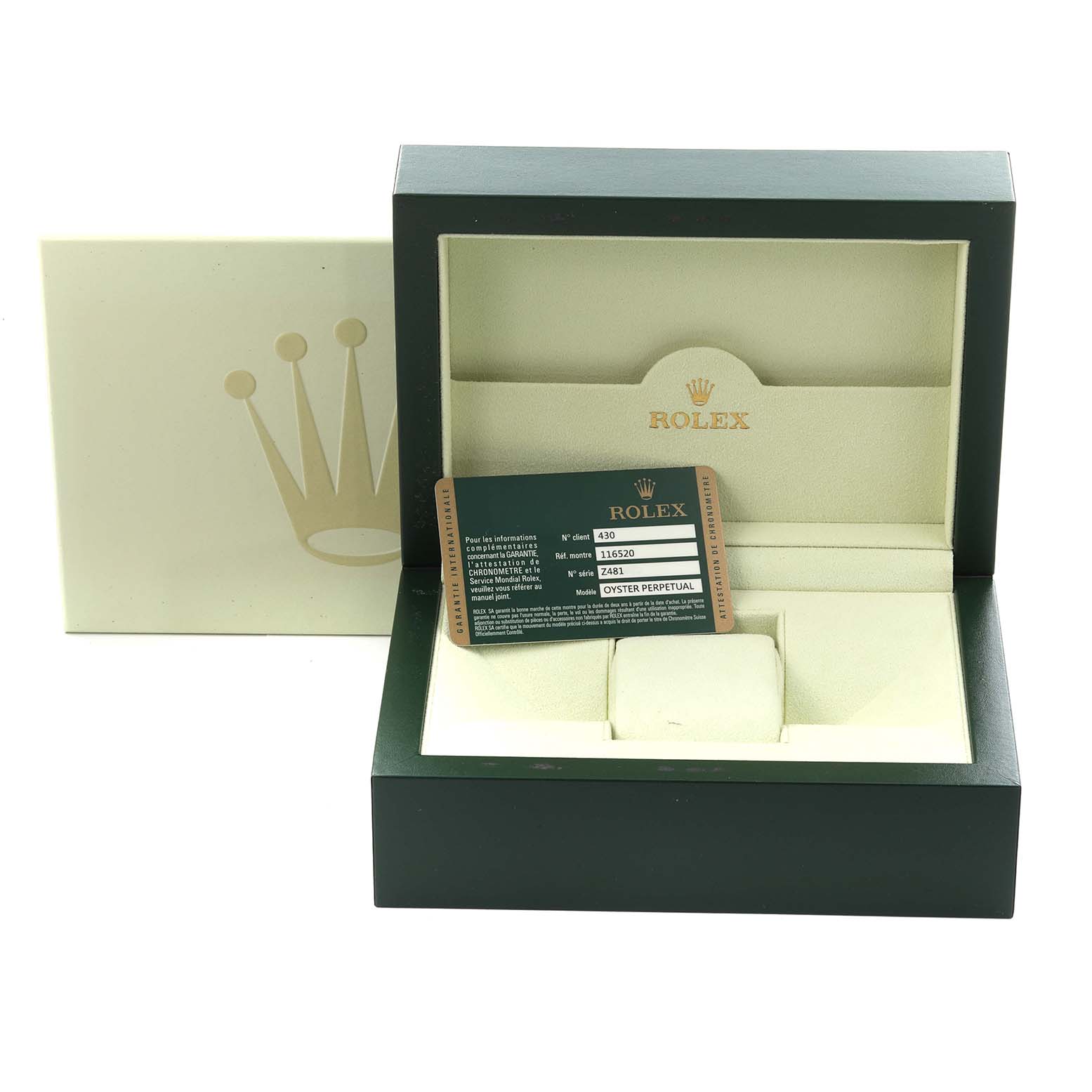 The image shows the Rolex Daytona 116520 Men's Stainless Steel Black Dial 116520 Men's Stainless Steel Black Dial watch box, open, with a card inside, viewed from the front.