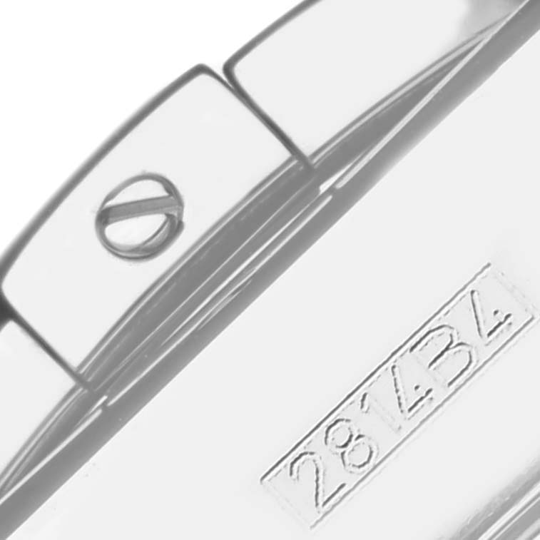 The image shows a close-up of the bracelet clasp and serial number of a Breitling Chronomat AB0115 Men's Stainless Steel Silver Dial AB0115 Men's Stainless Steel Silver Dial.