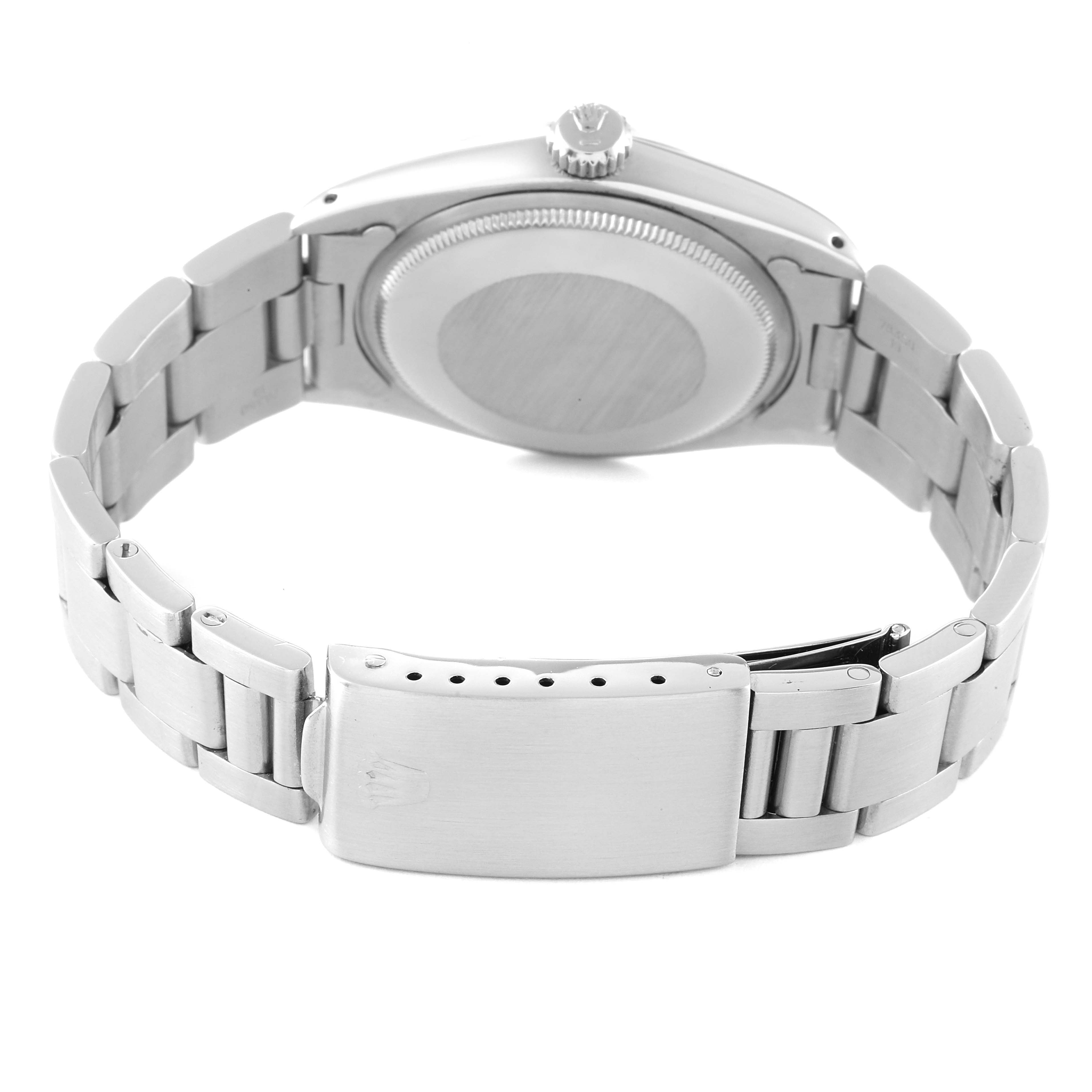 The image shows the back of a Rolex Date 1500 Men's Stainless Steel Black Dial 1500 Men's Stainless Steel Black Dial model watch, focusing on its case back, crown, and bracelet with a clasp.