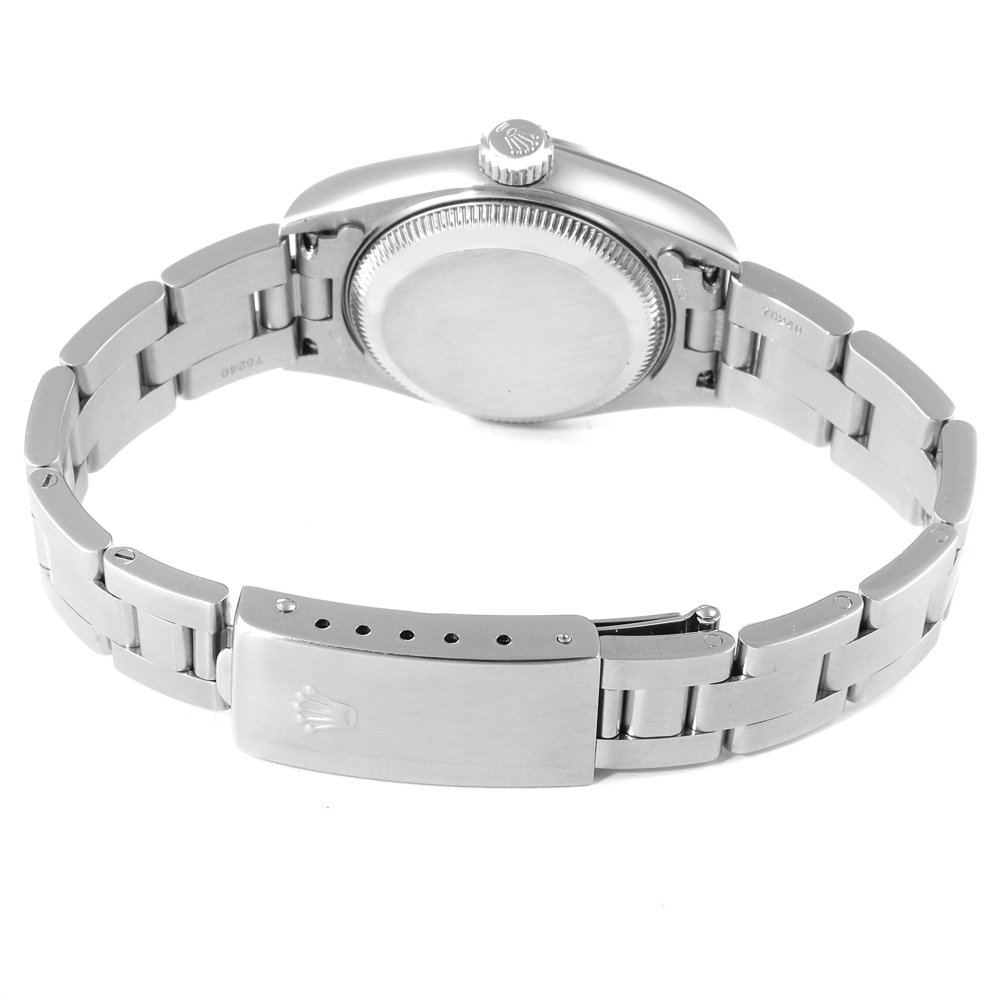 This image shows the back case and metal bracelet of a Rolex Date 79160 Women's Stainless Steel White Dial 79160 Women's Stainless Steel White Dial model watch from an underside angle.