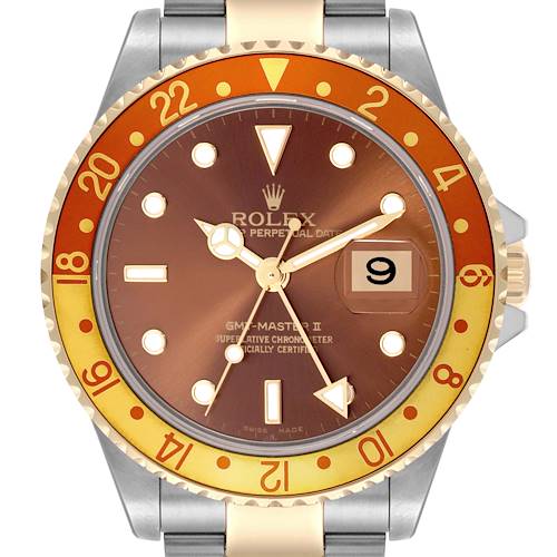 The Rolex GMT-Master 16713 Men's Steel and Gold (two tone) Brown Dial 16713 Men's Steel and Gold (two tone) Brown Dial is shown from a front angle, highlighting the dial and bezel with the date feature.