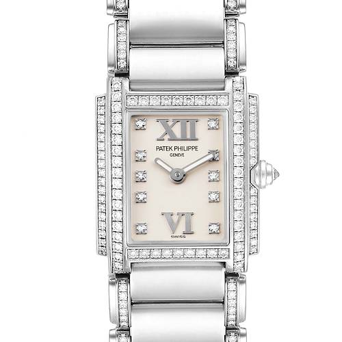 This image displays a Patek Philippe Twenty-4 4908/310G Women's White Gold Silver Dial 4908/310G Women's White Gold Silver Dial watch in a top-down view, showcasing the face, bracelet, and embellished details.