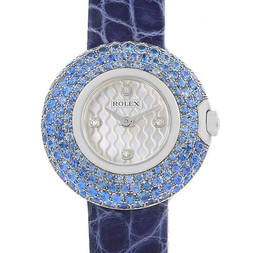 The image shows a Rolex Cellini 6201 Women's White Gold Mother of Pearl Dial 6201 Women's White Gold Mother of Pearl Dial watch with a gemstone-encrusted bezel, crown, and dial, with a blue strap, from a front angle.