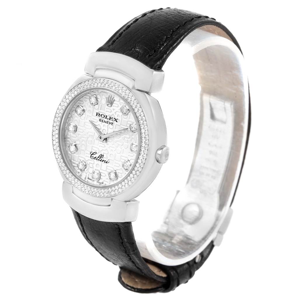 The Rolex Cellini 6671 Women's White Gold Silver Dial 6671 Women's White Gold Silver Dial watch is displayed at an angled side view showing the face, bezel, crown, and leather strap.