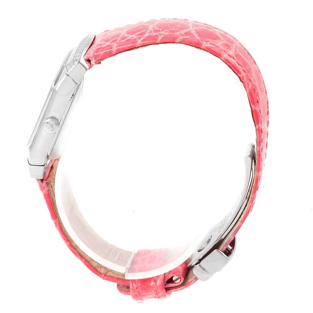 The image shows a side angle of a Rolex Cellini 6692 Women's White Gold Pink Dial 6692 Women's White Gold Pink Dial watch with a pink strap and silver case.