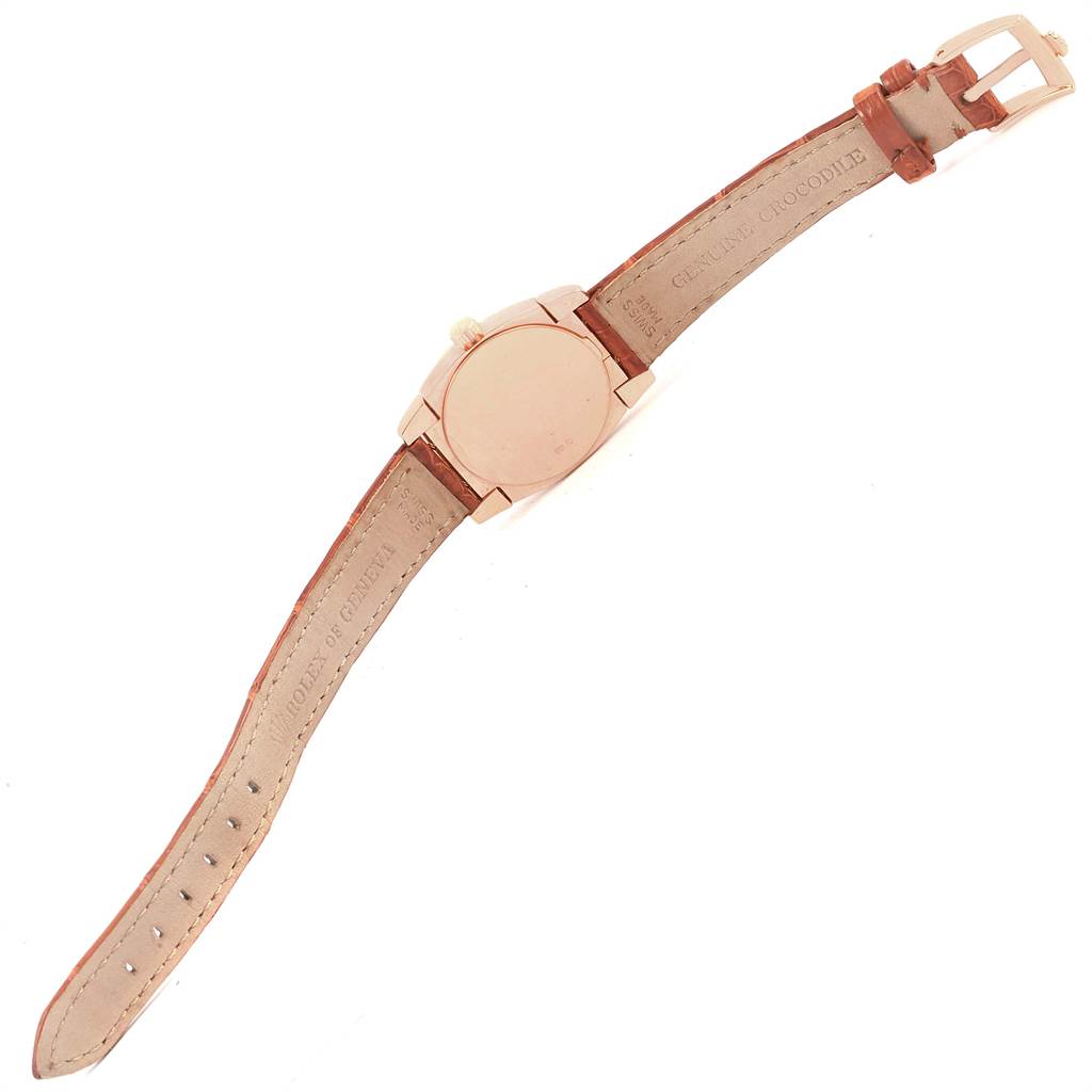 The image shows the back view of a Rolex Cellini 5310 Women's Rose Gold White Dial 5310 Women's Rose Gold White Dial watch, highlighting its case, leather strap, and buckle.