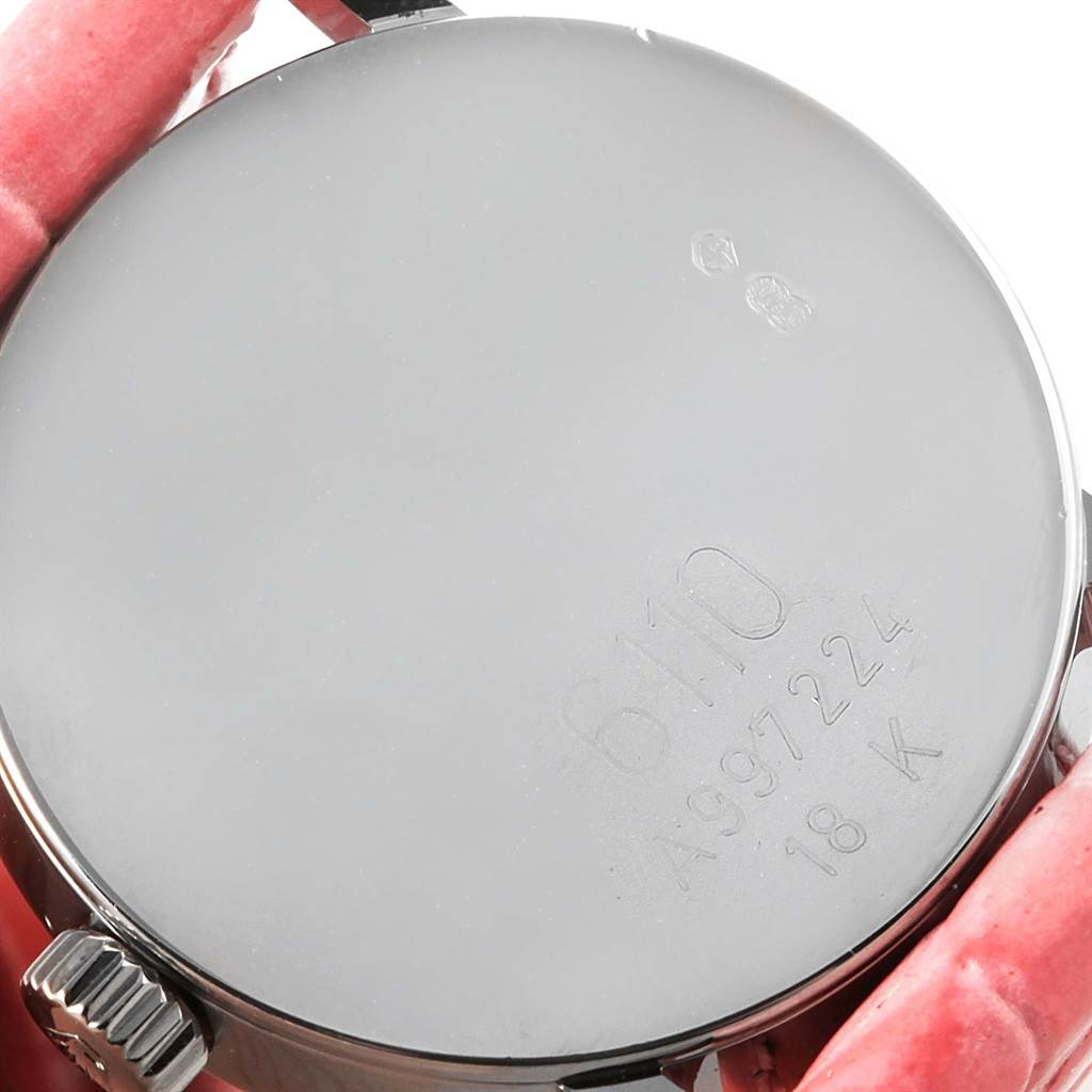 The image shows the back case of a Rolex Cellini 6110 Women's White Gold Silver Dial 6110 Women's White Gold Silver Dial watch, featuring a 6110 model number and 18K gold marking.