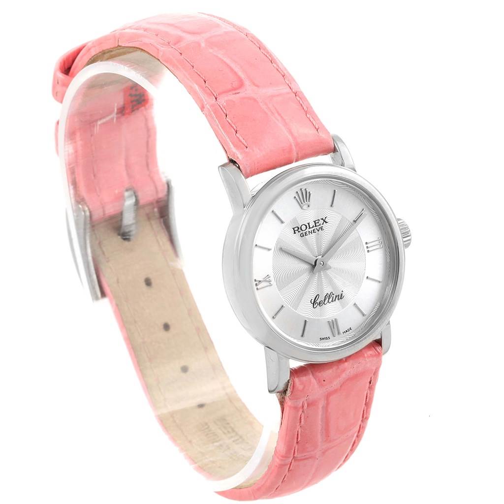 The image shows a Rolex Cellini 6110 Women's White Gold Silver Dial 6110 Women's White Gold Silver Dial watch with a pink leather strap, viewed from an angled perspective.