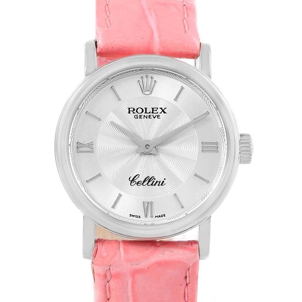 The Rolex Cellini 6110 Women's White Gold Silver Dial 6110 Women's White Gold Silver Dial watch is shown from a front angle, displaying its dial, bezel, case, and a portion of its pink strap.