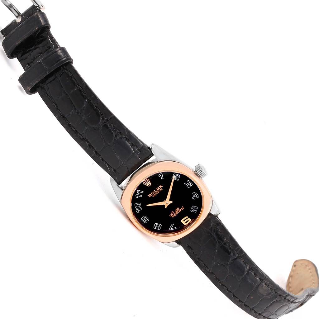 The Rolex Cellini 6229 Women's White Gold Black Dial 6229 Women's White Gold Black Dial watch is shown at an angle displaying the face, bezel, and leather strap.
