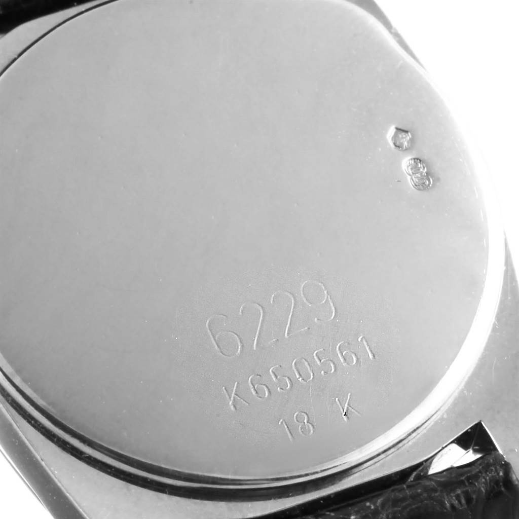 This image shows the case back of the Rolex Cellini 6229 Women's White Gold Black Dial 6229 Women's White Gold Black Dial model, displaying the engraved model number and serial number.