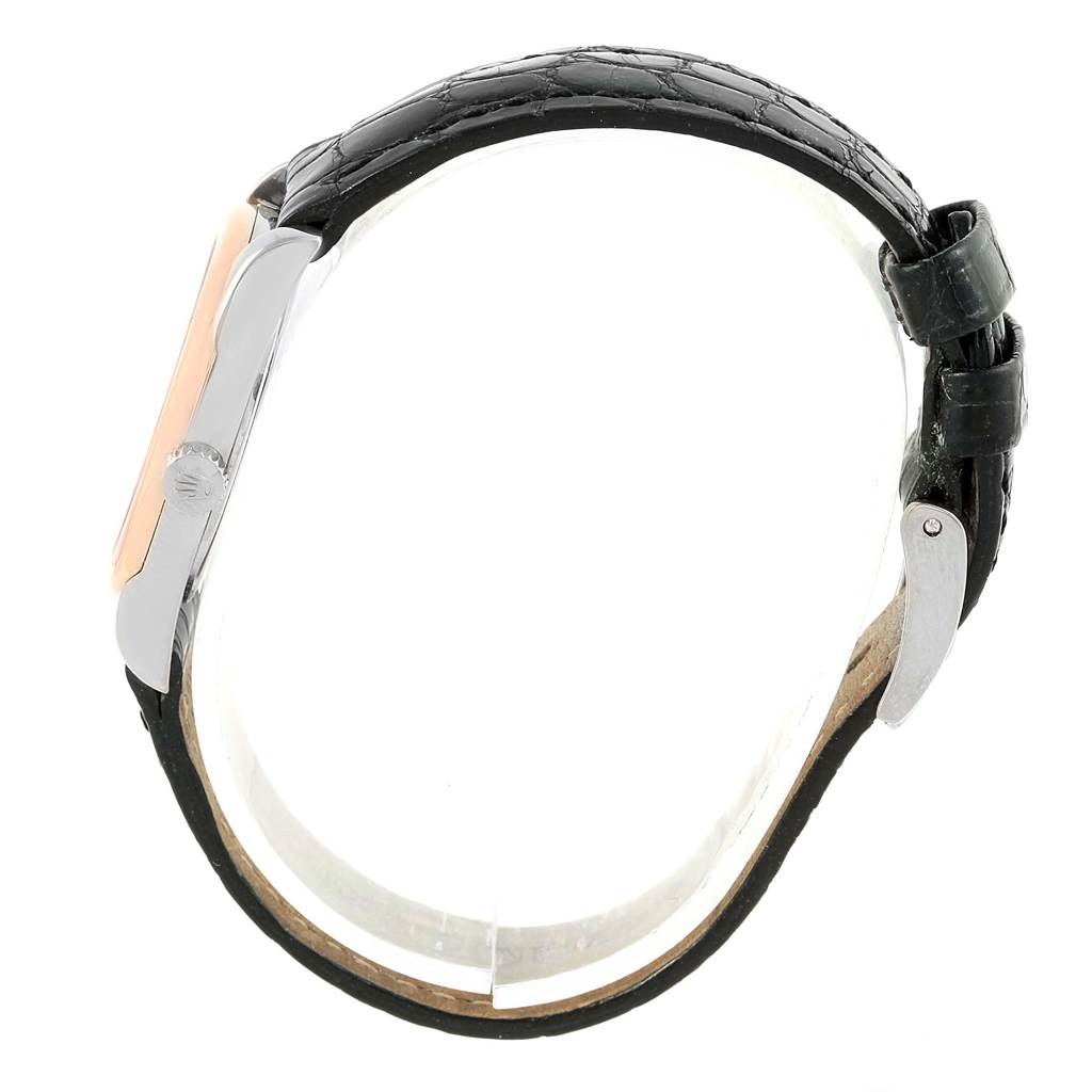 This image shows the side profile of a Rolex Cellini 6229 Women's White Gold Black Dial 6229 Women's White Gold Black Dial watch, highlighting the crown, bezel, and leather strap.