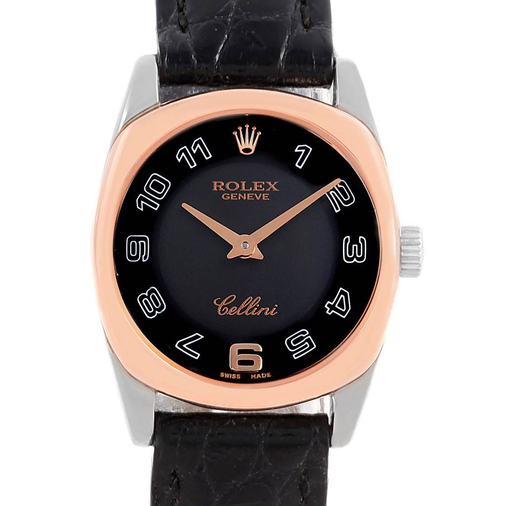The Rolex Cellini 6229 Women's White Gold Black Dial 6229 Women's White Gold Black Dial watch is shown from a front angle, displaying its black dial, gold hands, and leather strap.