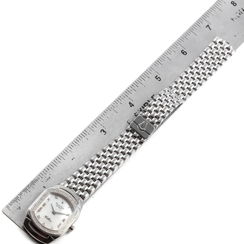 The image shows a Rolex Cellini 6691 Women's White Gold Mother of Pearl Dial 6691 Women's White Gold Mother of Pearl Dial watch with a silver bracelet and clasp, placed next to a ruler for scale.