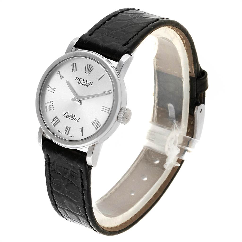 The image shows a Rolex Cellini 6110 Women's White Gold Silver Dial 6110 Women's White Gold Silver Dial watch at a three-quarter angle, highlighting the face, dial, crown, and leather strap.