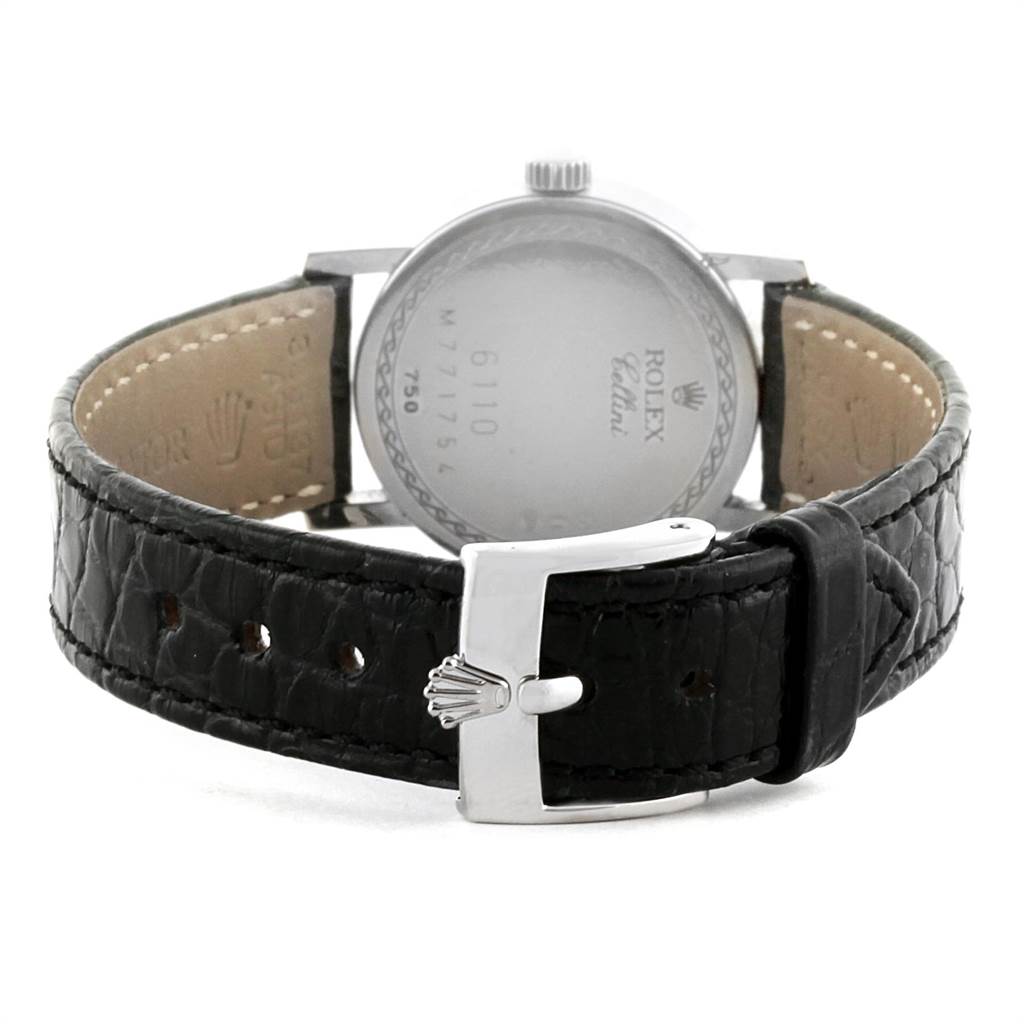 The image shows the back view of the Rolex Cellini 6110 Women's White Gold Silver Dial 6110 Women's White Gold Silver Dial watch, highlighting the leather strap and buckle.
