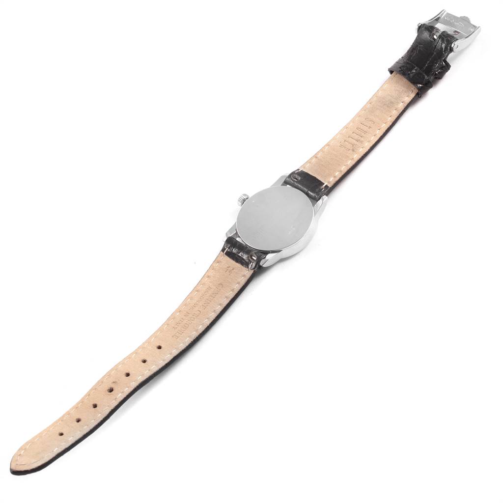 This image shows the back case and leather strap of a Rolex Cellini 6111 Women's White Gold Silver Dial 6111 Women's White Gold Silver Dial watch laid out flat.