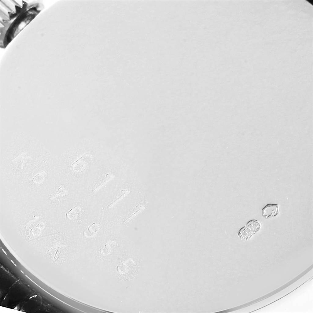The image shows the back case of a Rolex Cellini 6111 Women's White Gold Silver Dial 6111 Women's White Gold Silver Dial watch with engraved model and serial numbers.