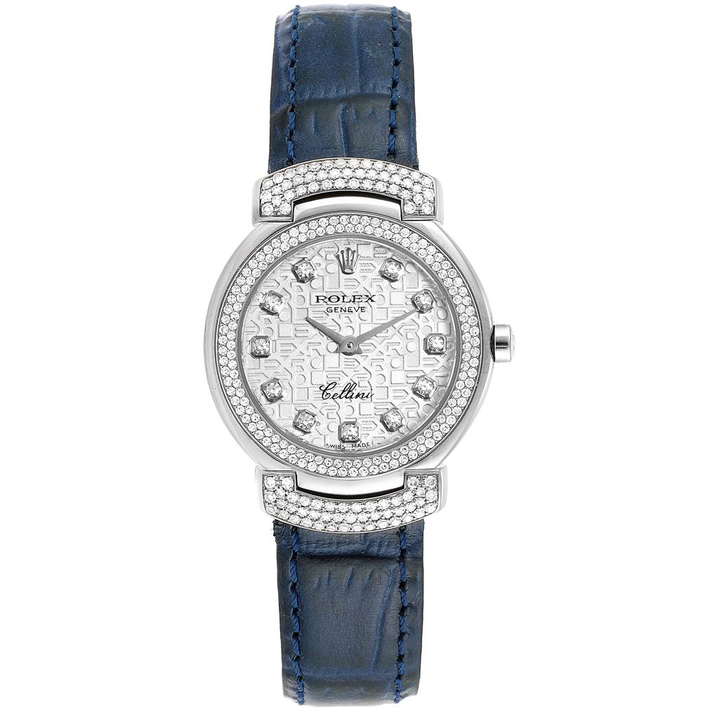The image shows a Rolex Cellini 6673 Women's White Gold Silver Dial 6673 Women's White Gold Silver Dial model watch from a front view, highlighting its face, bezel, and blue leather strap.