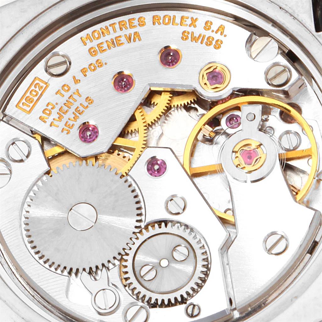 This image shows a close-up of the internal mechanism of a Rolex Cellini 5310 Women's White Gold Mother of Pearl Dial 5310 Women's White Gold Mother of Pearl Dial watch, highlighting the gears and jewel settings.