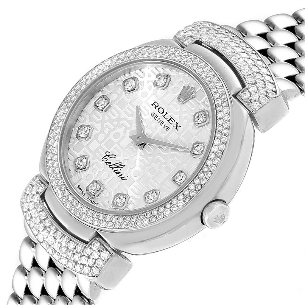 The image shows a close-up of the Rolex Cellini 6673 Women's White Gold Silver Dial 6673 Women's White Gold Silver Dial watch face, bezel, and part of the bracelet at an angle.