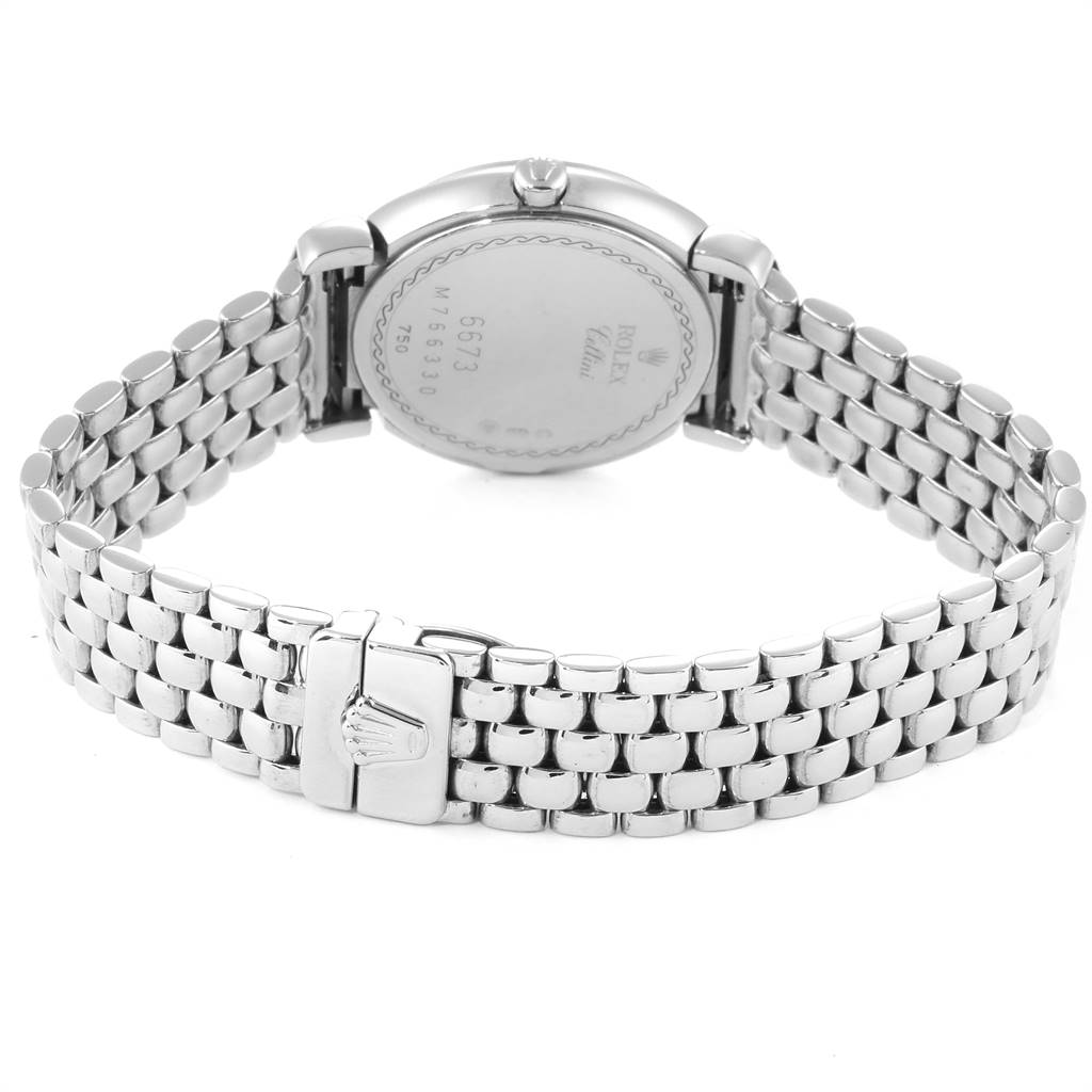 The image shows the back view of a Rolex Cellini 6673 Women's White Gold Silver Dial 6673 Women's White Gold Silver Dial watch, highlighting the case back and metal bracelet with the clasp.