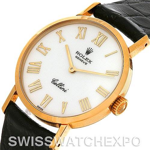 The image shows a Rolex Cellini 4109 Women's Yellow Gold White Dial 4109 Women's Yellow Gold White Dial watch from an angled top view, highlighting the face, Roman numeral markers, gold case, and a part of the leather strap.