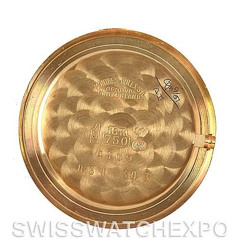 This image shows the inner side of the back casing of a Rolex Cellini 4109 Women's Yellow Gold White Dial 4109 Women's Yellow Gold White Dial watch, displaying inscriptions and engravings.